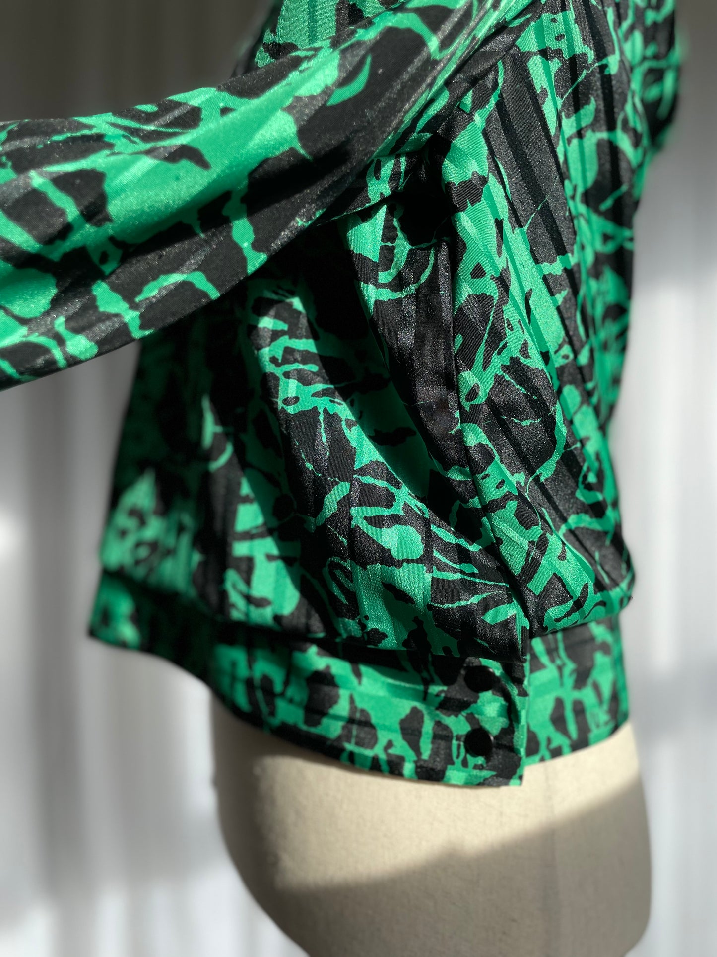 Green and black 80s draped blouse