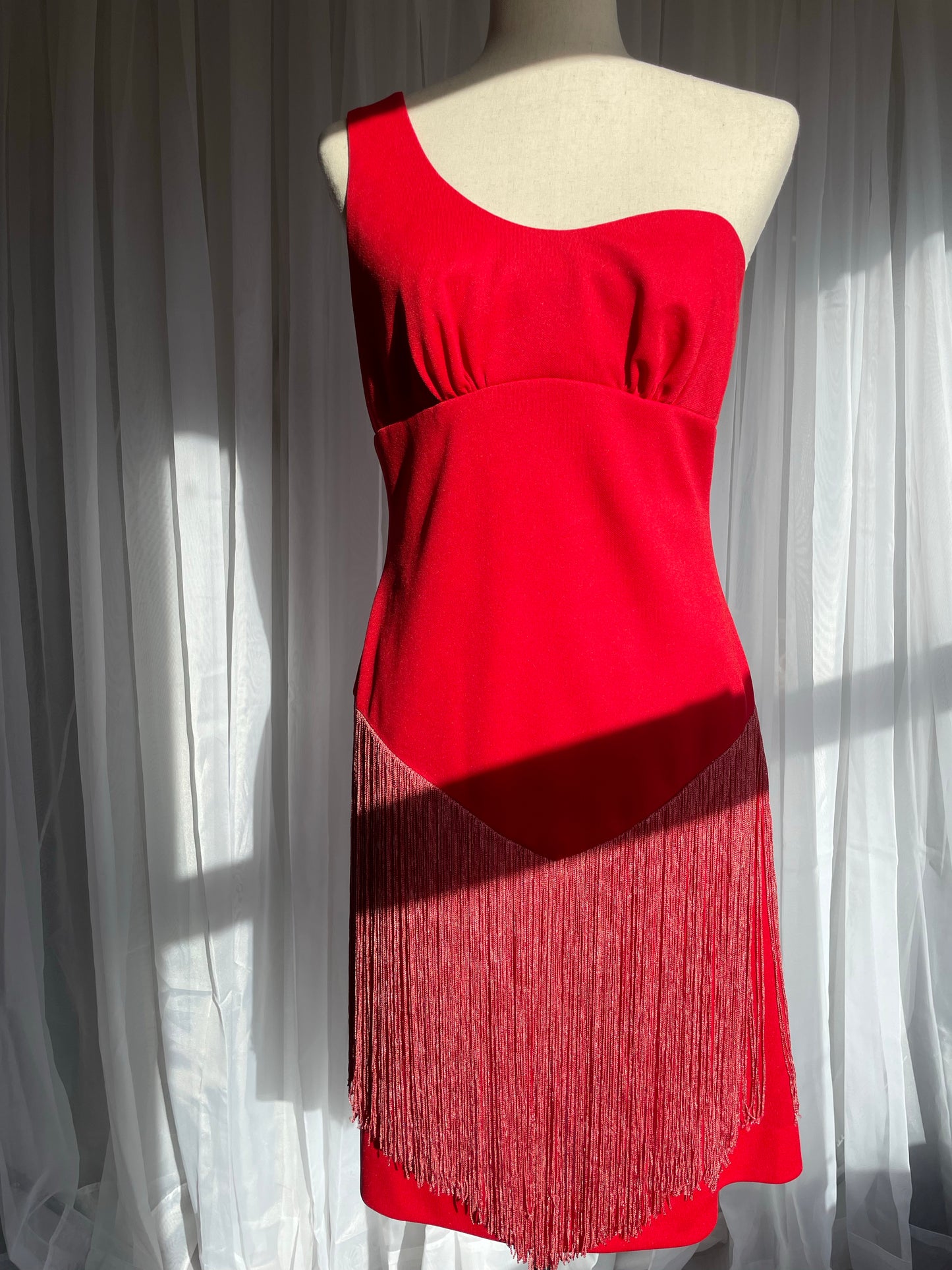 Cherry red 70s Fredericks of Hollywood fringe mini dress